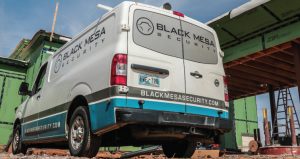 black mesa security service vehicle on job site
