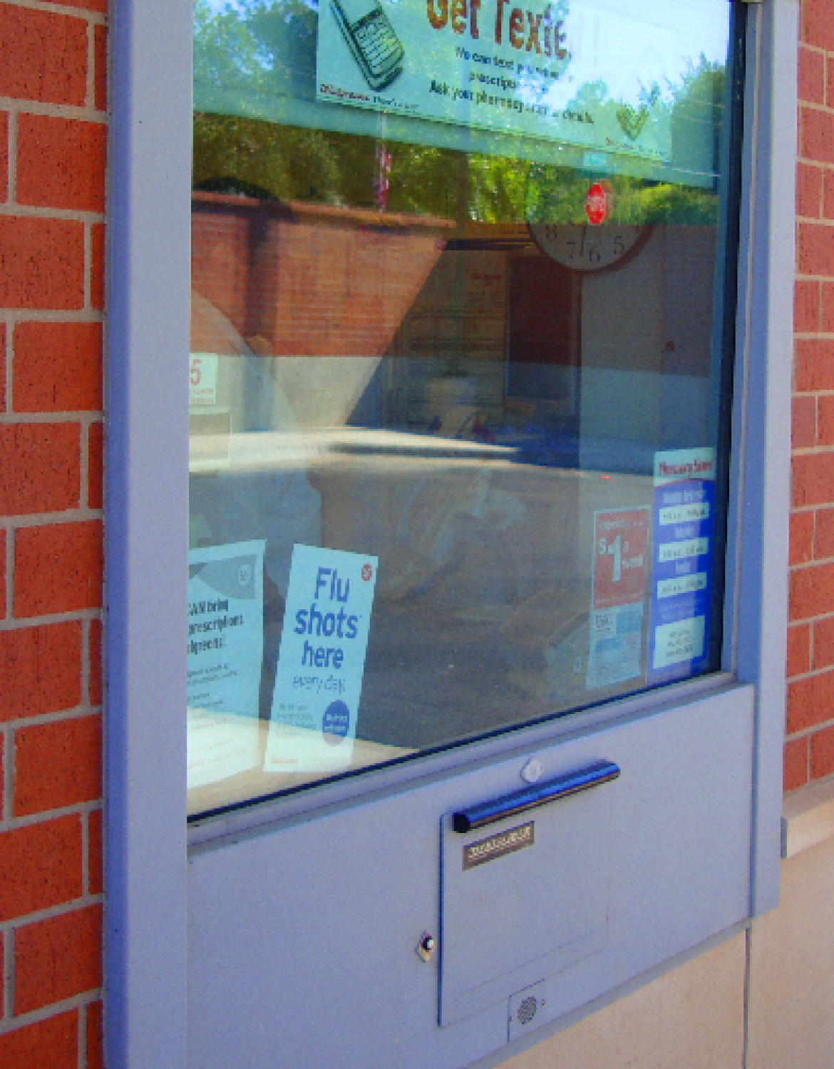 Pharmacy drive-up window installed by black mesa security